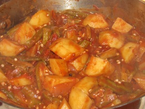 Fresh from the garden okras, tomatoes and potatoes make this heartyorganic vegan Greek stew